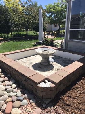 converting a tiled water fountain to an above ground flower garden 21921365