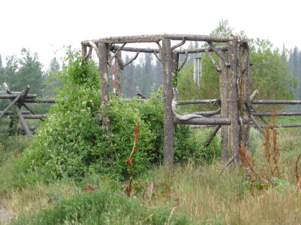 Woodhenge, a log and branch gazebo